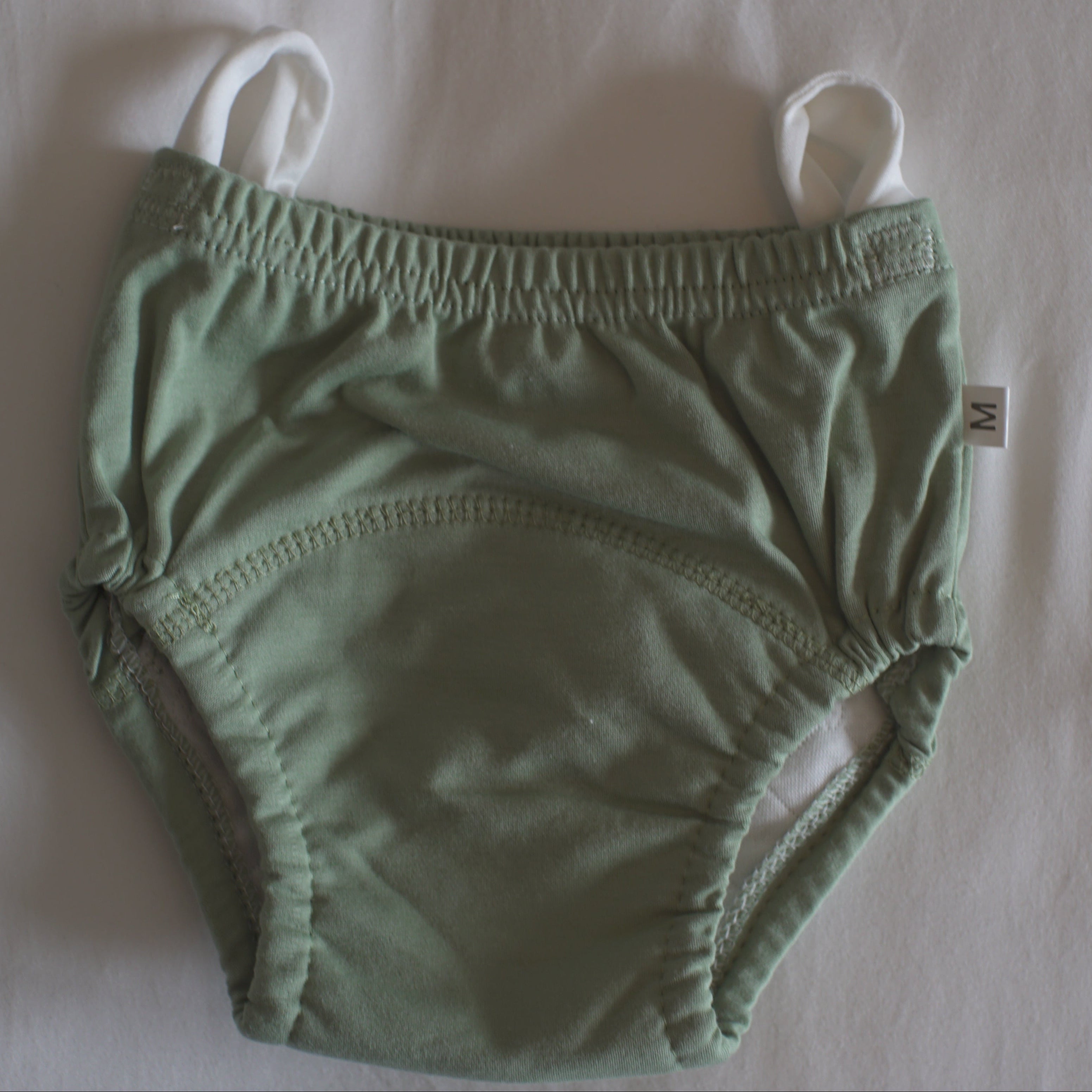 teal training underwear with loops on waistband