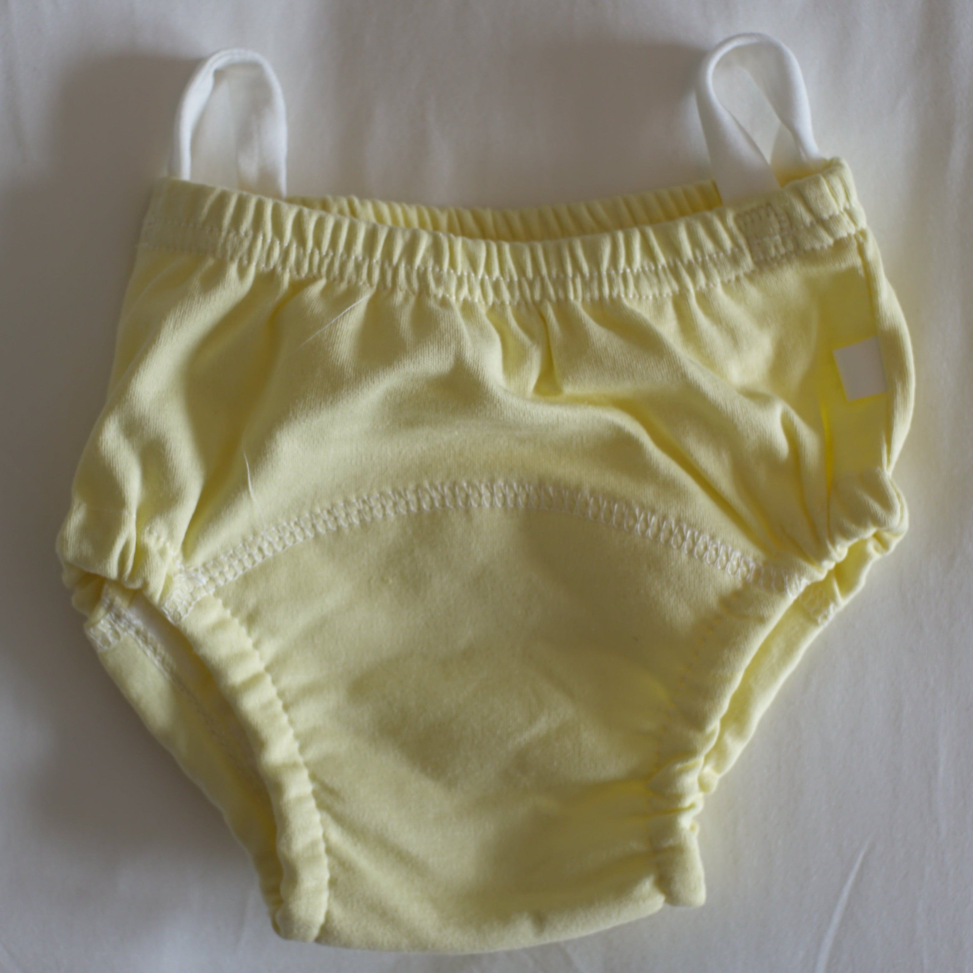yellow training underwear with loops on waistband